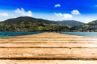 Jetty over river against sky