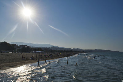 Scenic view of sea against clear sky on sunny day