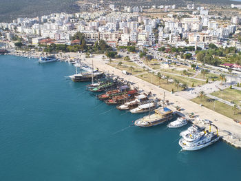 High angle view of harbor and buildings in city