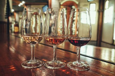 Wineglasses on wooden table