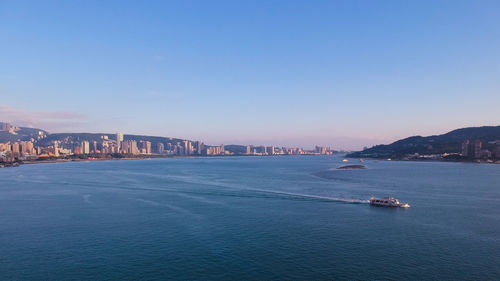 Scenic view of sea against blue sky