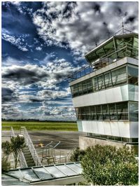 Built structure against cloudy sky