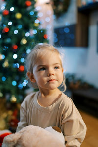 Portrait of cute girl with teddy bear