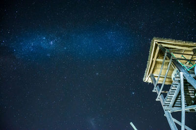 Low angle view of building against sky at night