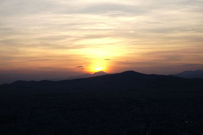 Scenic view of mountains at sunset