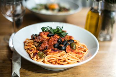 Close-up of pasta served on table