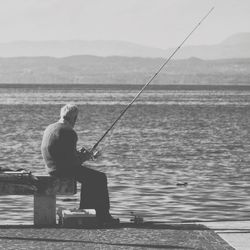 Man sitting in sea