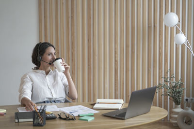 Businesswoman working at office