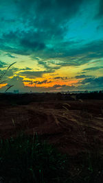 Scenic view of dramatic sky during sunset