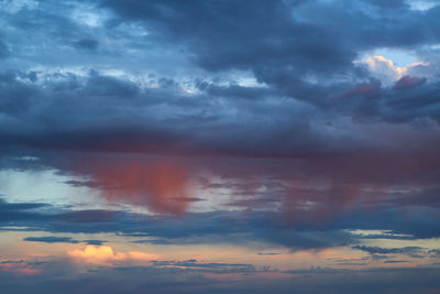 Low angle view of dramatic sky during sunset