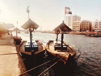 Boats moored in sea