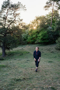 Full length of woman on field