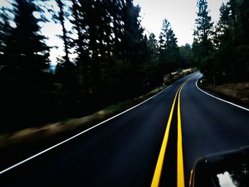 Road passing through country road