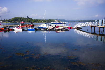 Portaferry marina jetty with the strangford lough ferry in the background