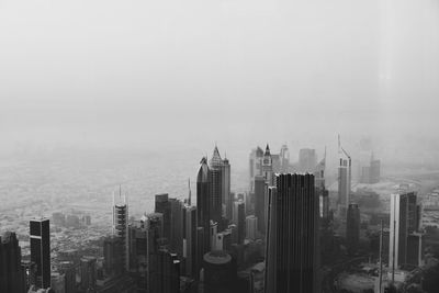 Modern buildings in city against sky