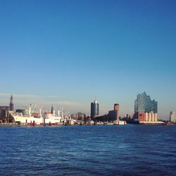 Sea with city in background