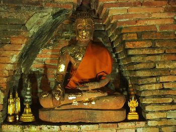 Statue in illuminated room