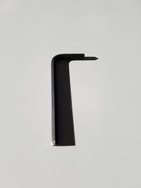 Close-up of electric lamp against white background