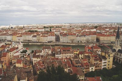 Aerial view of cityscape against sky