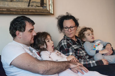 Full length of father and daughter at home