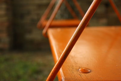 Close-up of orange swing