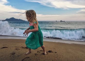 Girl running on beach