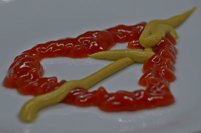 Close-up of red chili peppers in plate