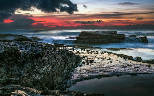 Scenic view of sea against sky during sunset