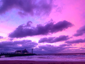 Scenic view of sea against dramatic sky