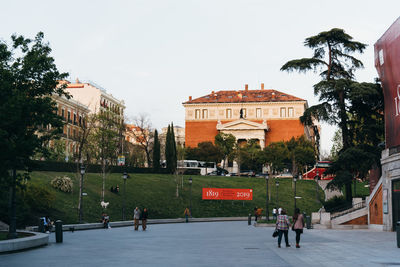 Group of people in front of building