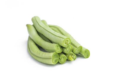 Close-up of green pepper against white background