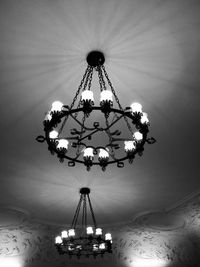 Low angle view of illuminated chandelier