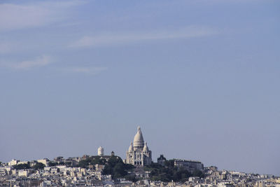 View of cityscape against clear sky