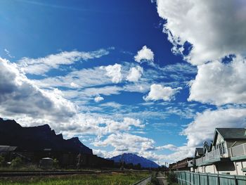 Low angle view of houses and buildings against sky