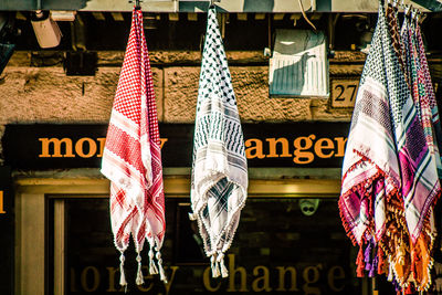 Clothes hanging on display at store