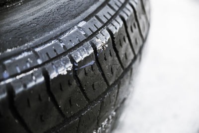 Close-up of tire in water