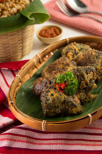 High angle view of food served in basket on table