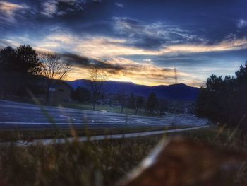 Scenic view of landscape against sky during sunset