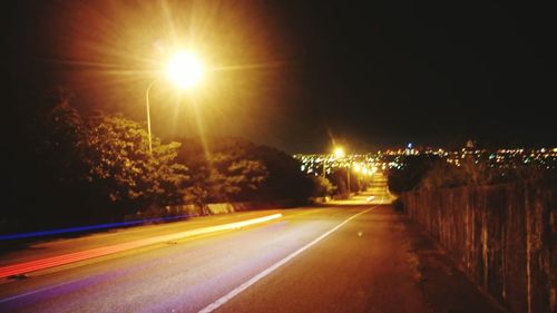 Light trails on road at night