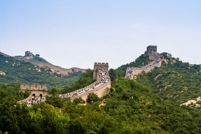 People on great wall of china on mountain