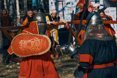 People standing in traditional clothing