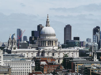 Modern buildings in city against sky