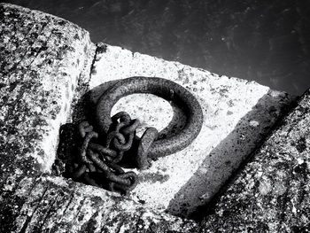 Close-up of abandoned boat in water