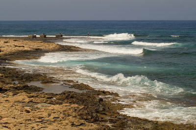 Scenic view of sea against clear sky