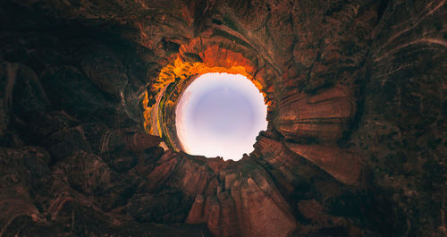 Low angle view of arch against sky during sunset