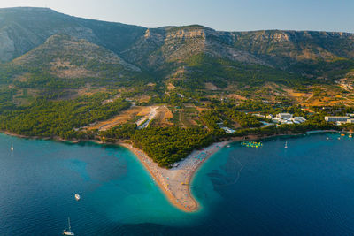 Aerial scene of zlatni rat beach on brac island, croatia