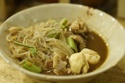 Close-up of noodles in bowl on table