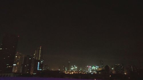 Illuminated cityscape at night