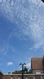 Low angle view of buildings against blue sky