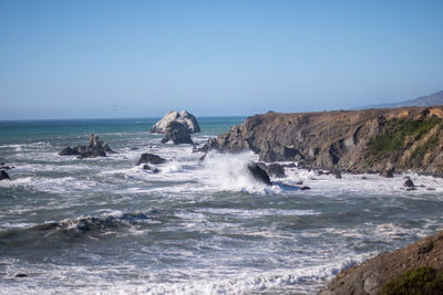 Scenic view of sea against clear sky